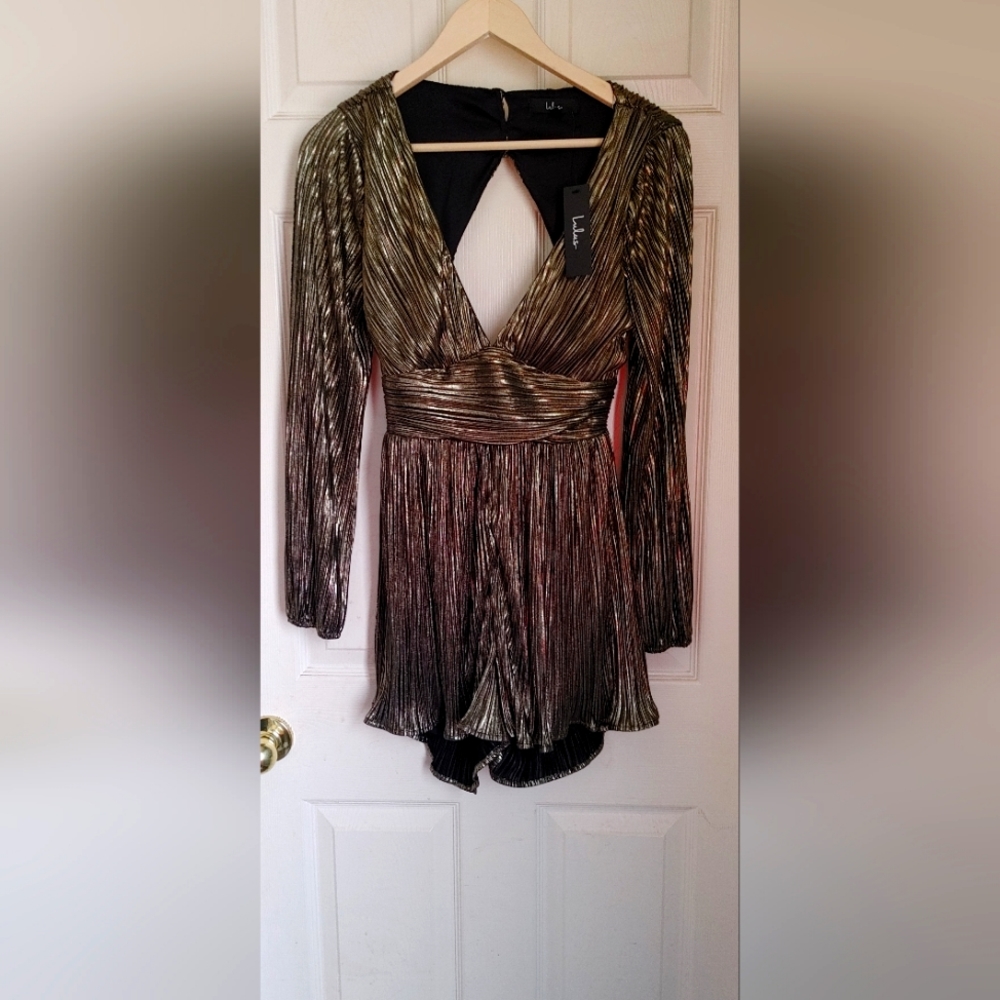 Lulu's romper size small with tags.